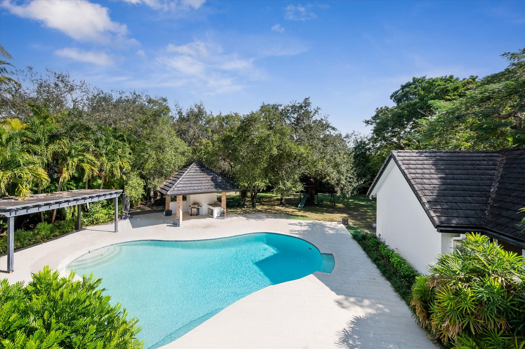 Heated saltwater pool with pergola and BBQ gazebo